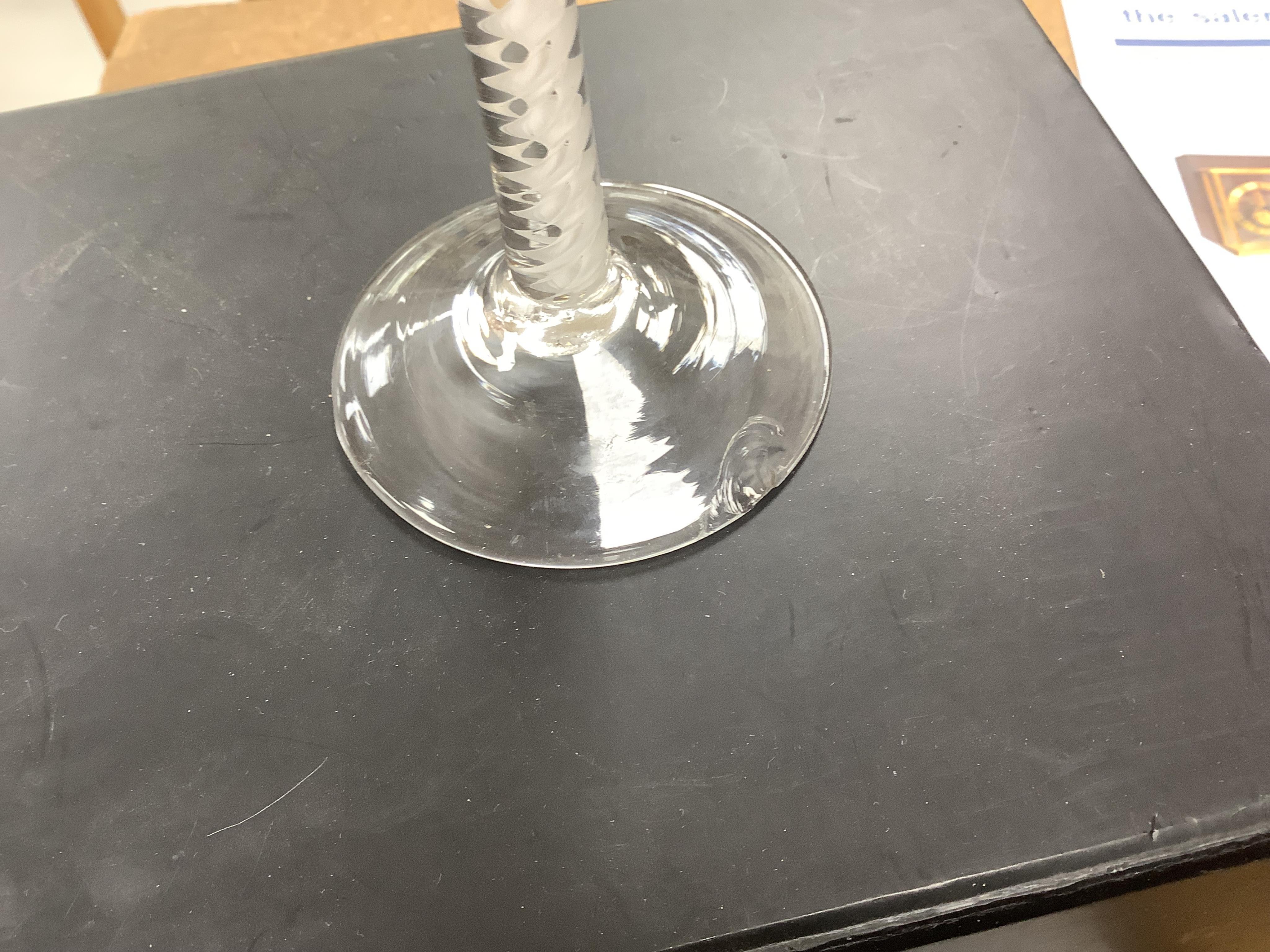 Two 18th century DSOT cordial glasses, one bowl engraved with roses, the other with swag decoration, tallest 16.5cm